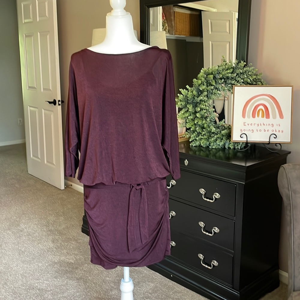 Deep Purple with Black tones Rouching at thighs & peek-a-boo back.